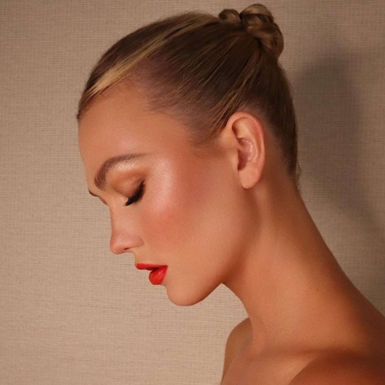 Karlie Kloss with a slicked-back ballet bun.