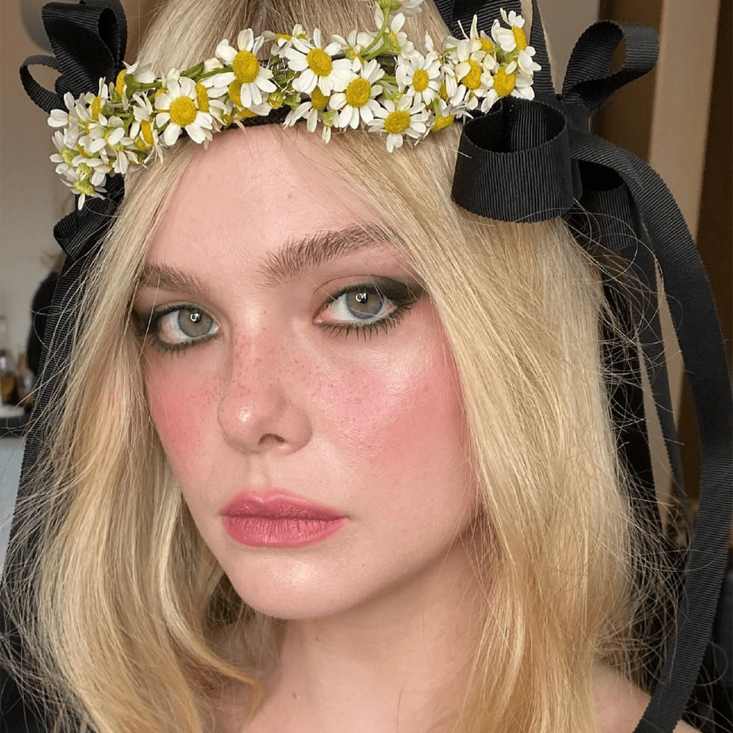 Elle Fanning wearing coquette makeup