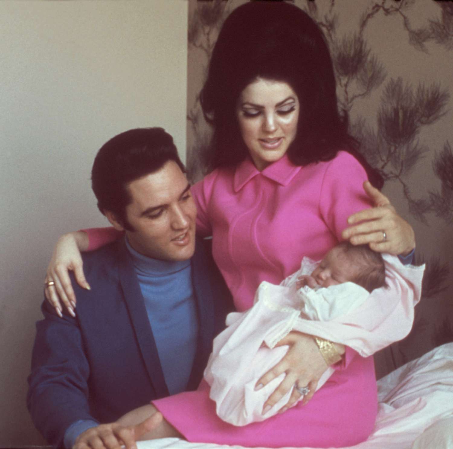 Elvis and Priscilla Presley family photo with their daughter