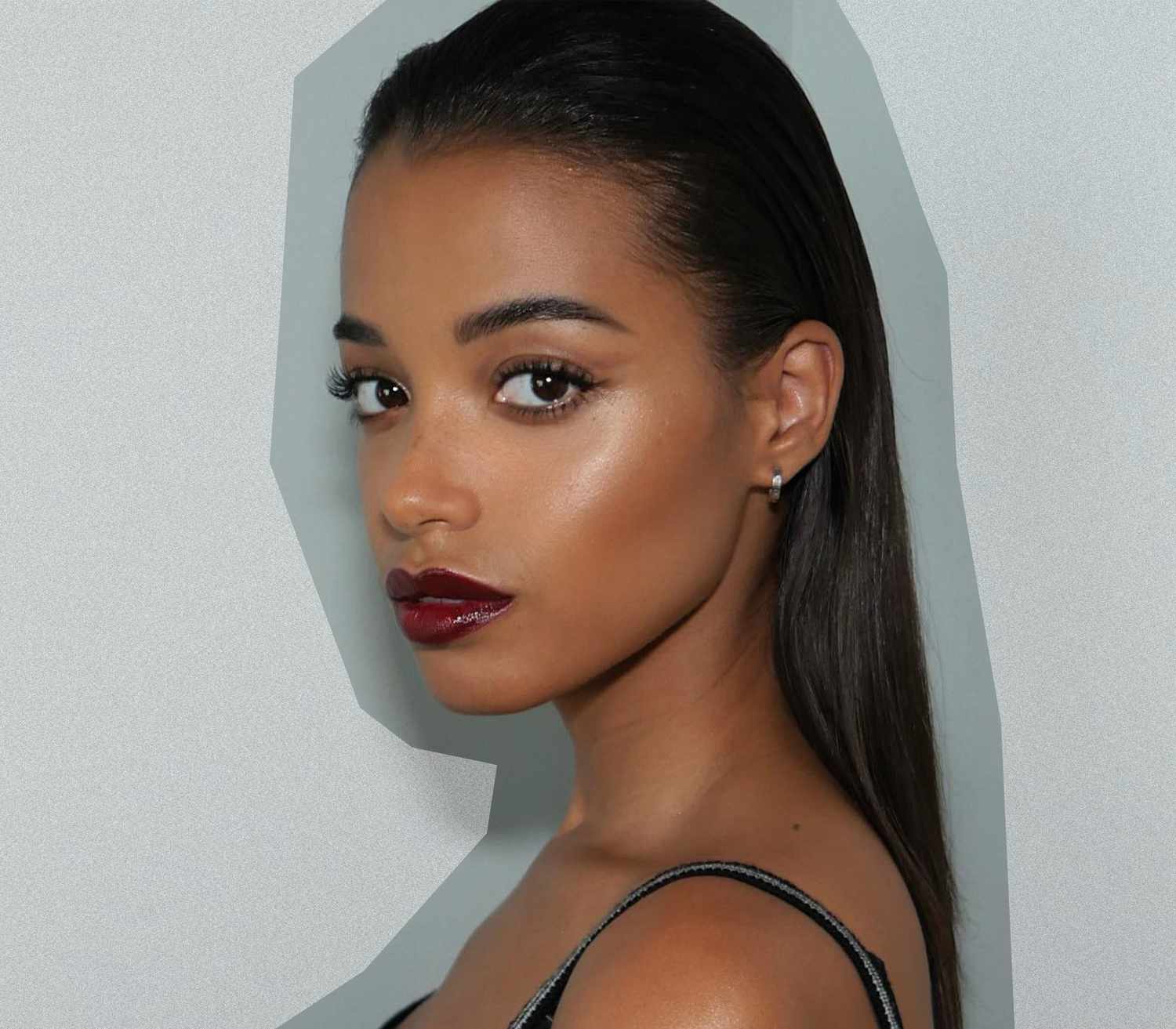 Ella Ballinska wearing shiny berry lips