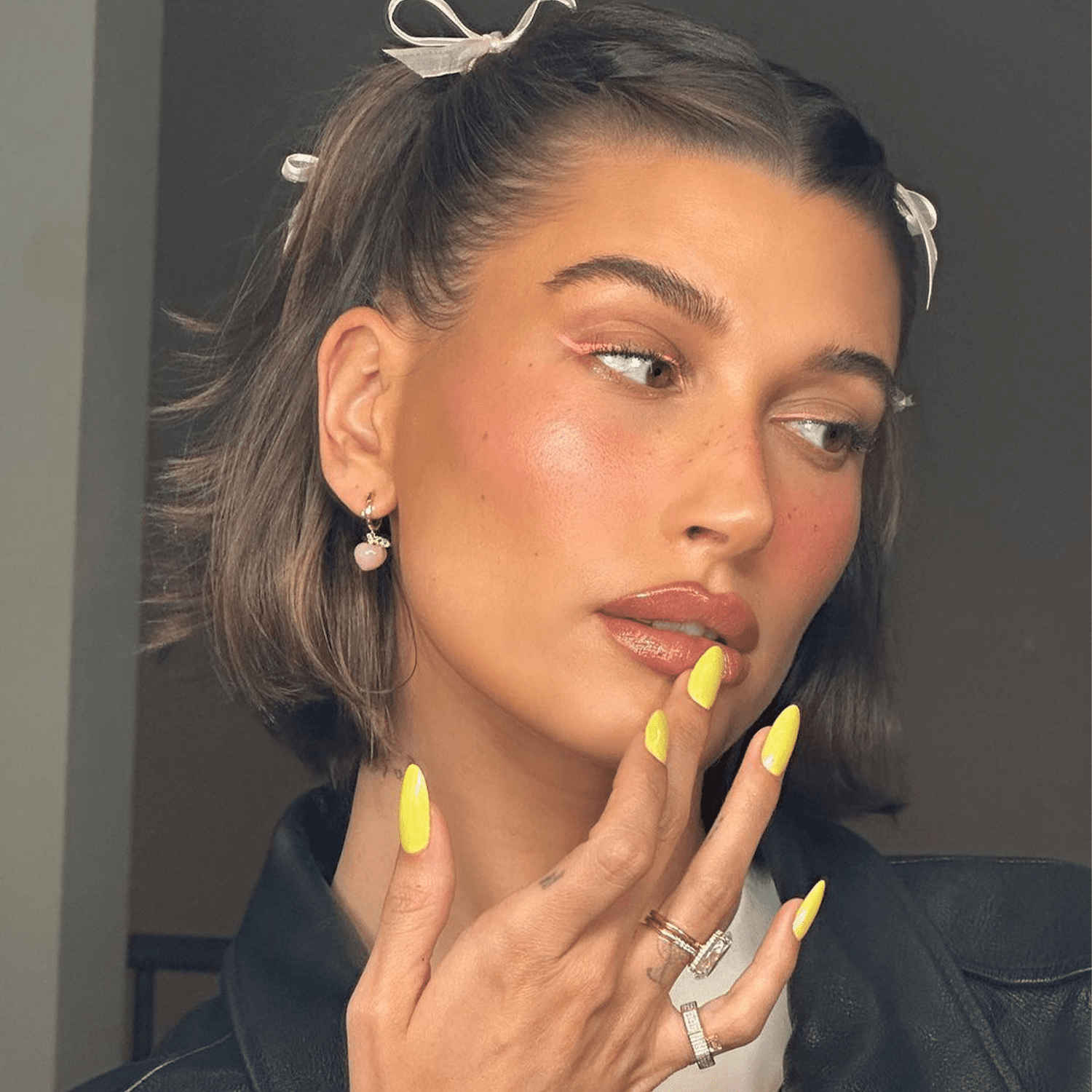 Hailey Bieber with lemonade nails 