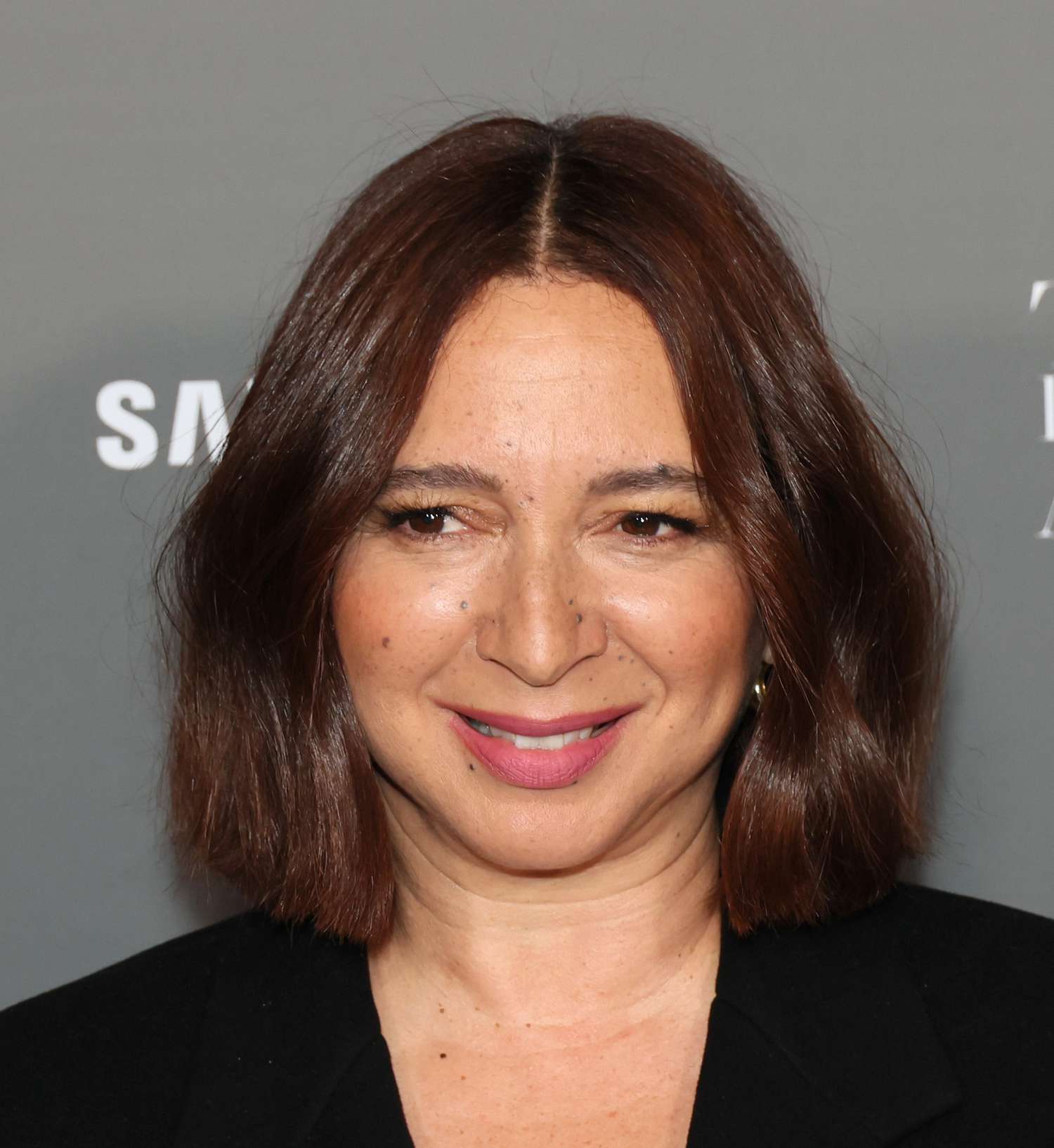 Maya Rudolph wearing minimal makeup and a full-bodied bob