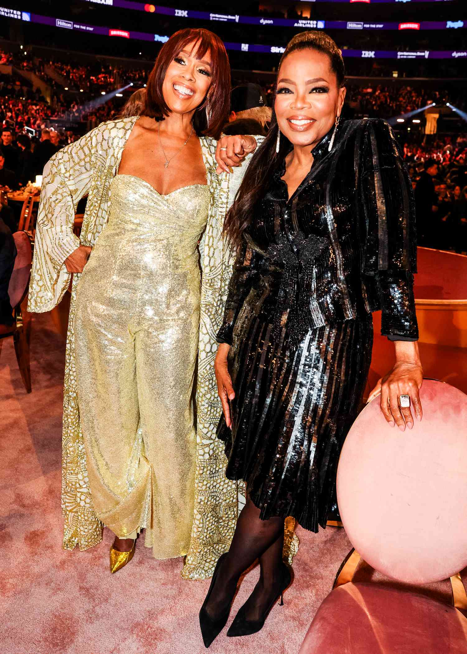 Oprah Winfrey and Gayle King wearing sequin looks at the Grammy Award show