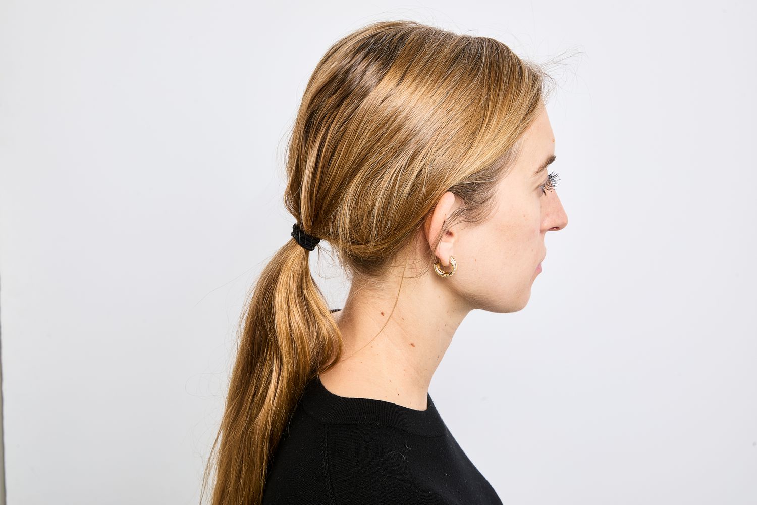 A person's hair in a ponytail after styling with BondiBoost Flex & Shine Aerosol-free Hair Spray for Brushable Hold