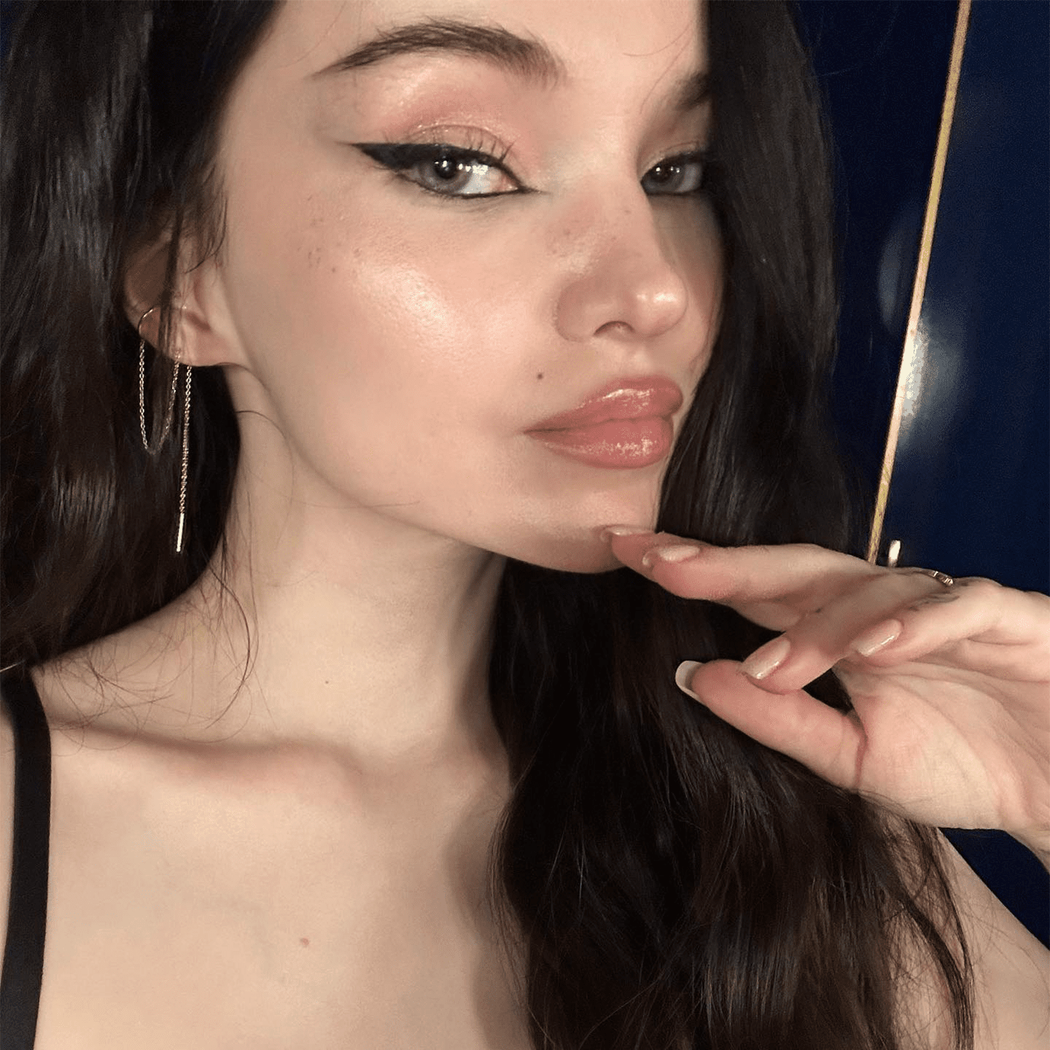 Dove Cameron wearing bold eyeliner