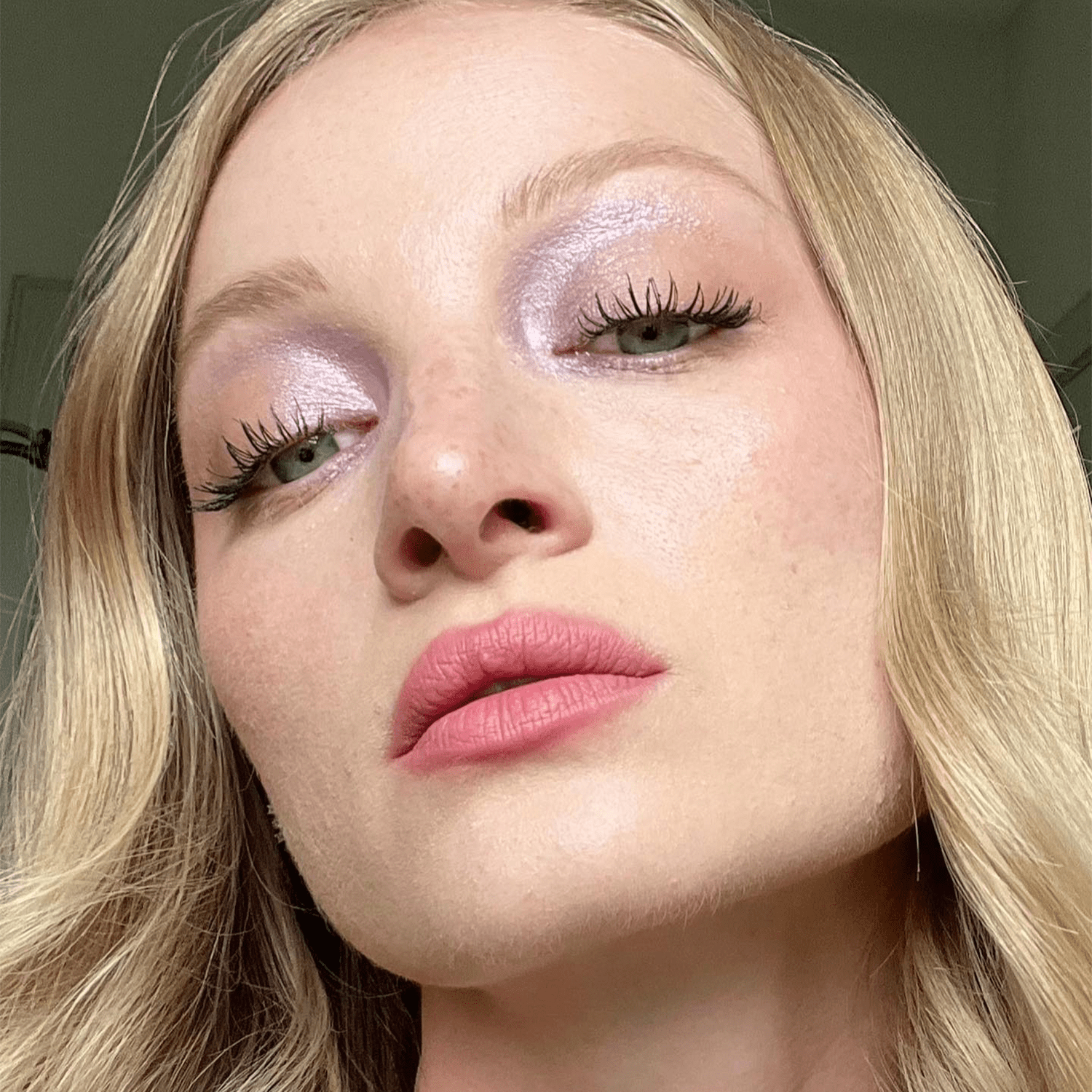 model wearing shimmering eye makeup