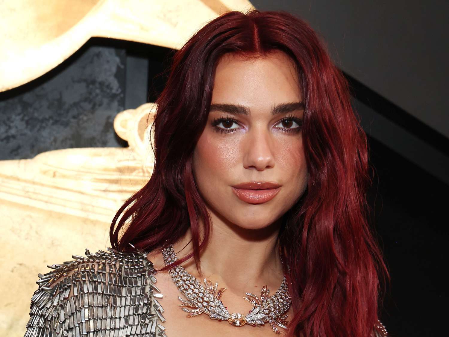 Dua Lipa Matched Her Metallic Eye Shadow to Her Dress at the 2024 Grammys