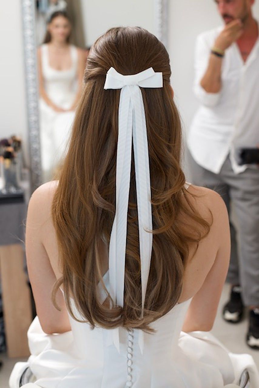 barbara palvin sprouse with a white bow in her hair for her wedding day 