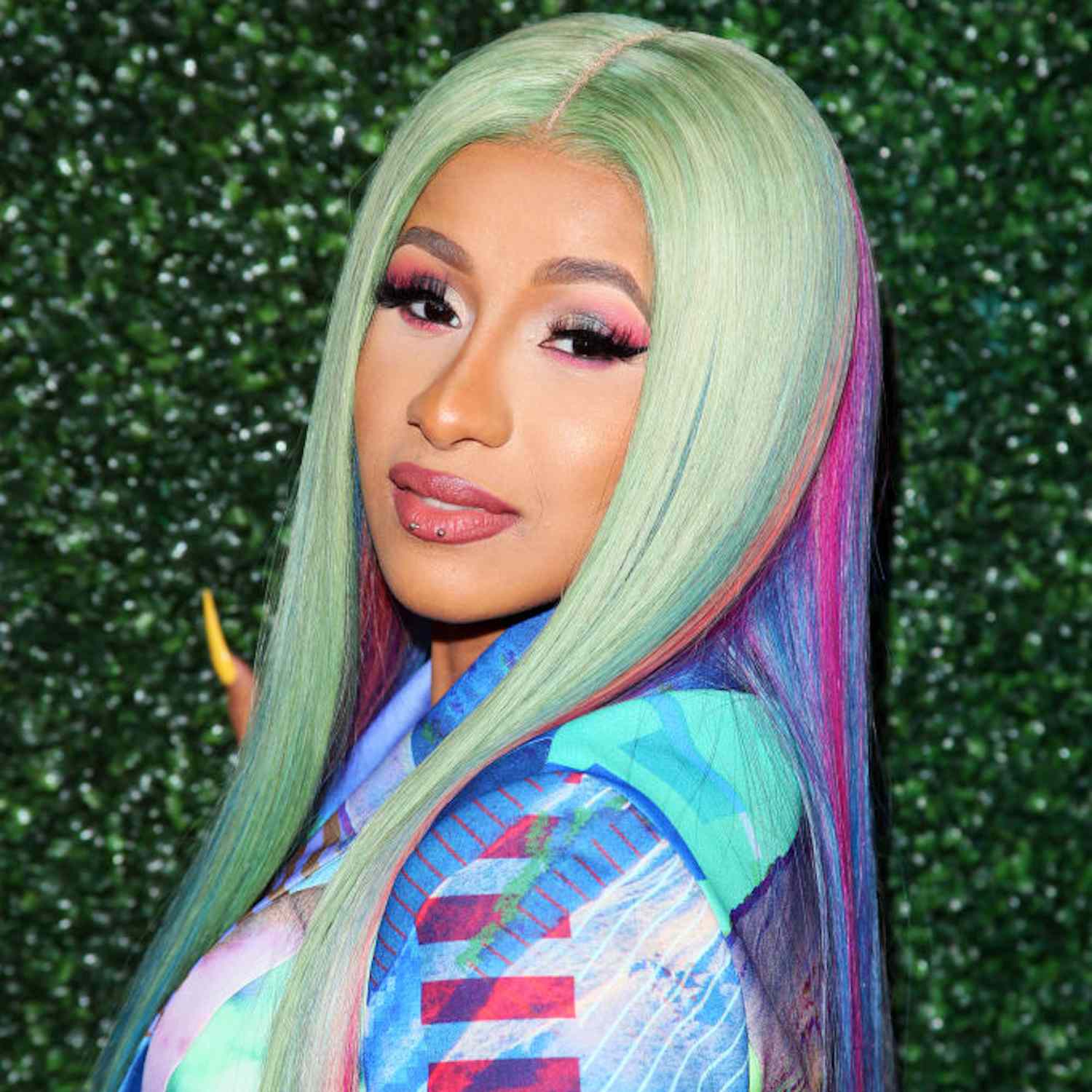 Cardi B with rainbow striped hair