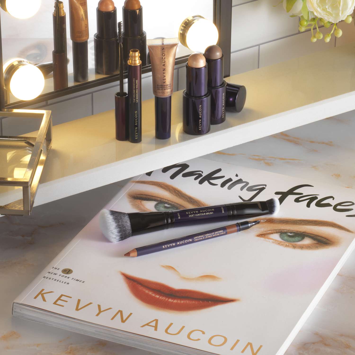 Kevyn Aucoin products next to his book, "Making Faces"