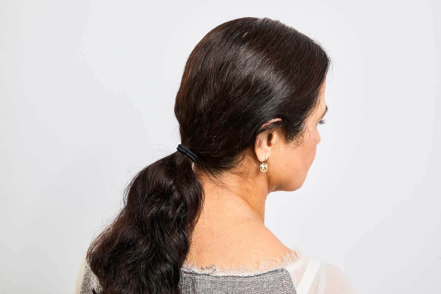 A person's ponytail after styling with Bumble and Bumble Spray de Mode Flexible Hold Hairspray