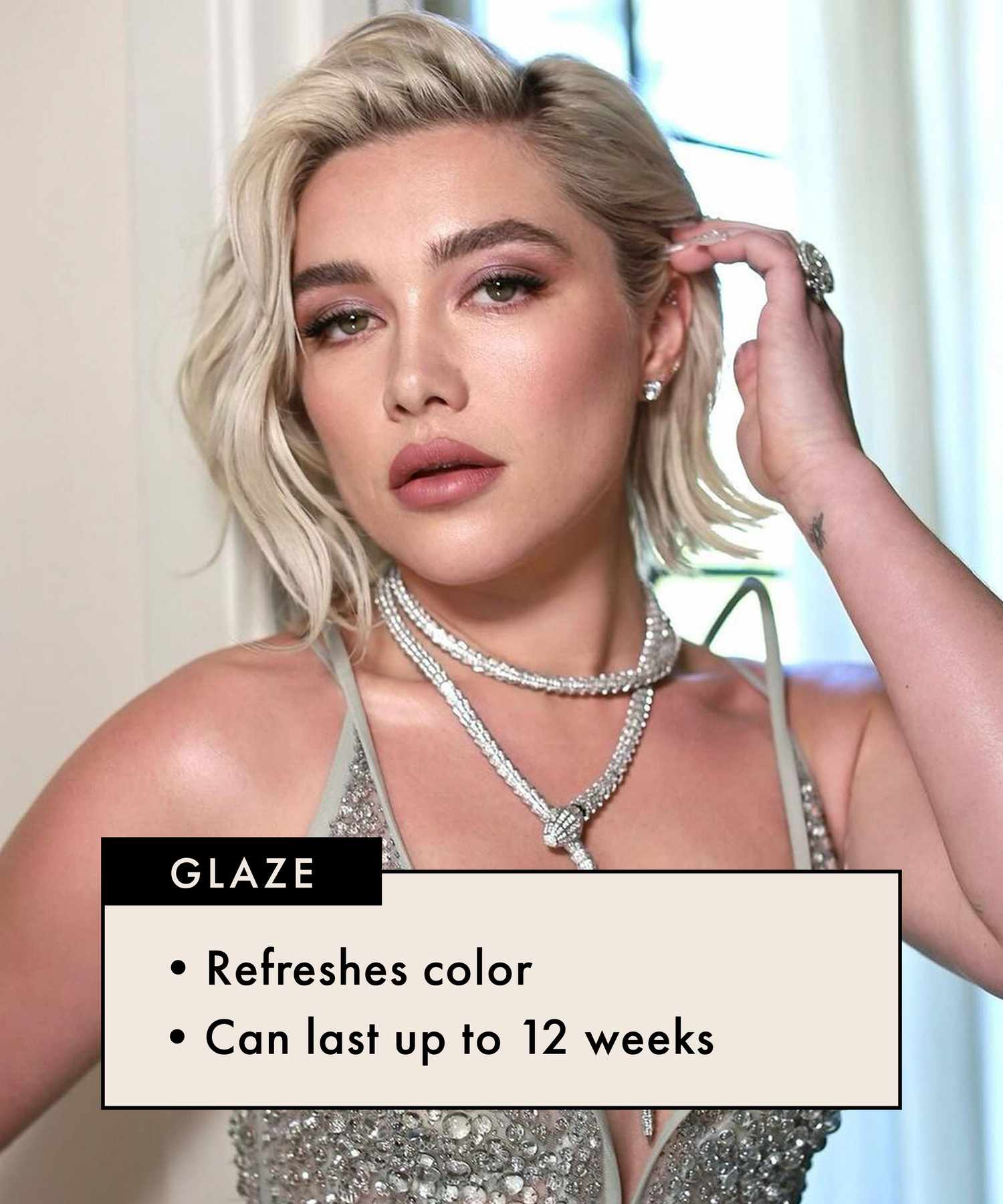 Florence Pugh with glossy white blonde hair