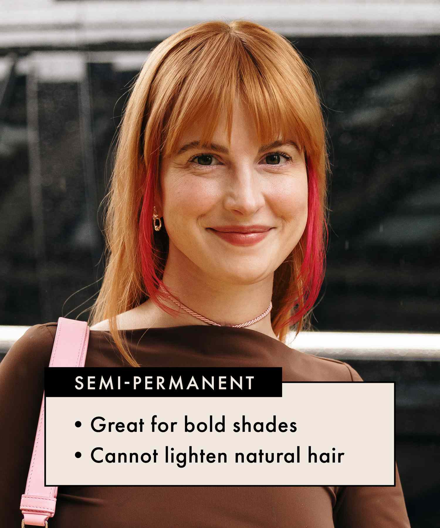 Hayley Williams with natural red hair and bright red face-framing pieces
