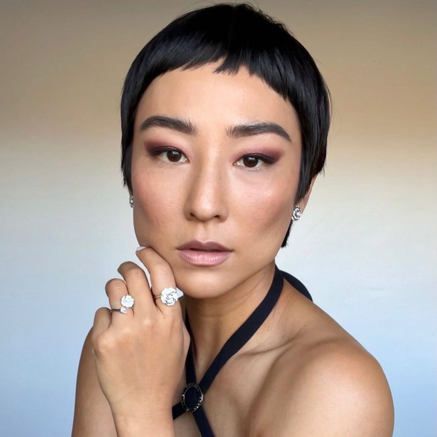 asian woman with short pixie hair cut