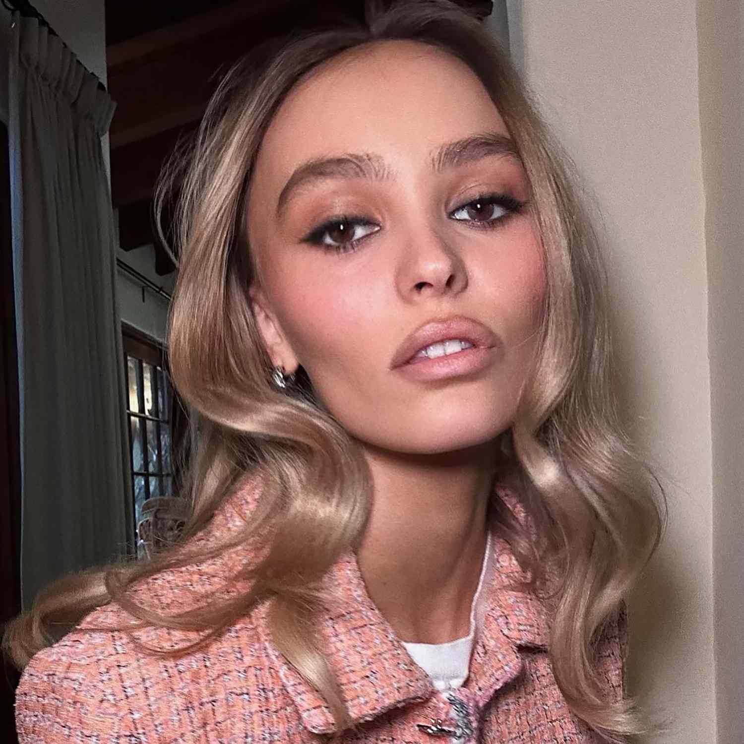 Lily-Rose Depp with mushroom blonde hair