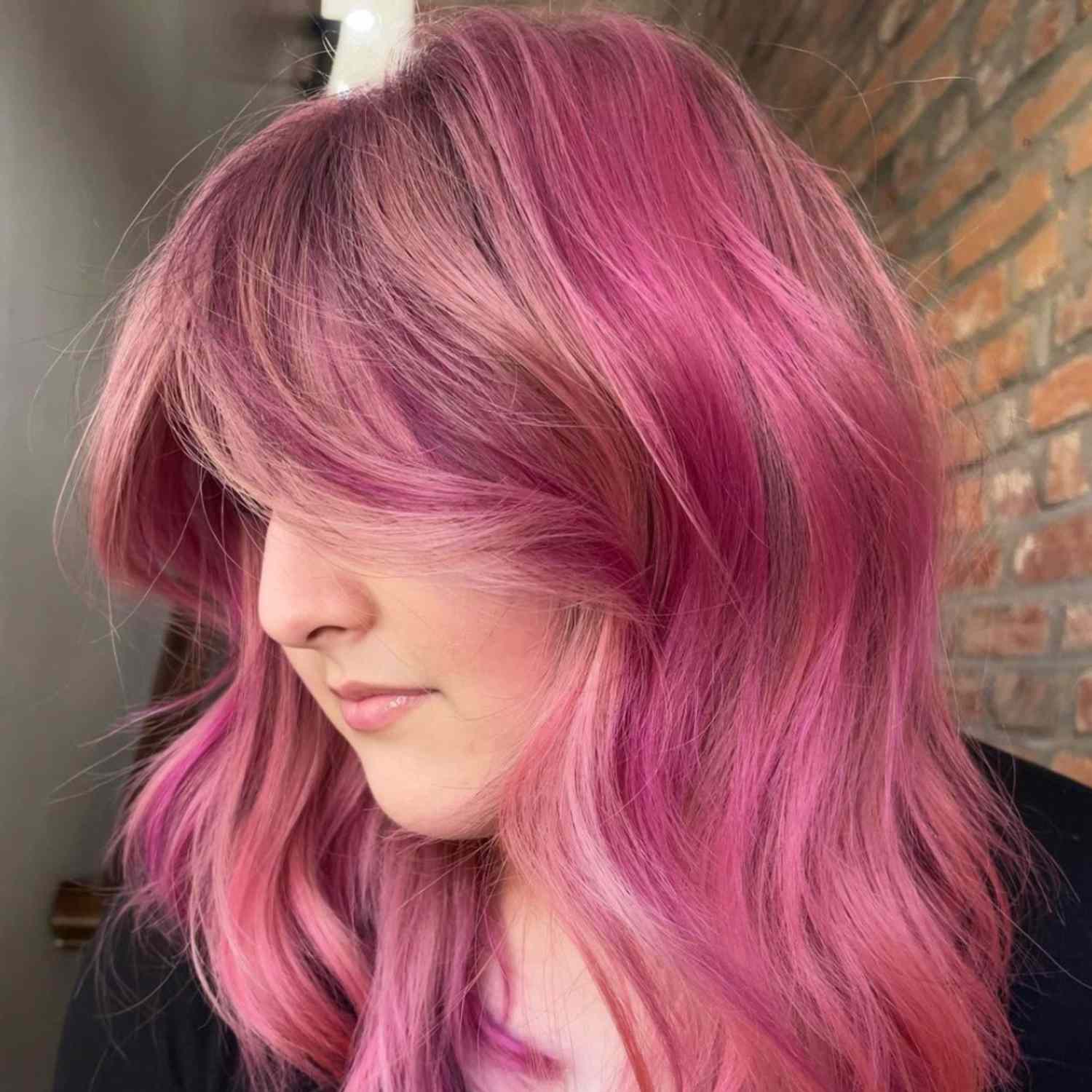 Lived-in pink hair color.