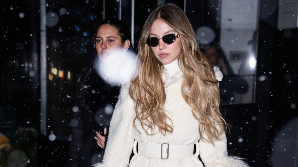 Sydney Sweeney Wore a White Fur-Trimmed Coat in New York’s Winter Wonderland