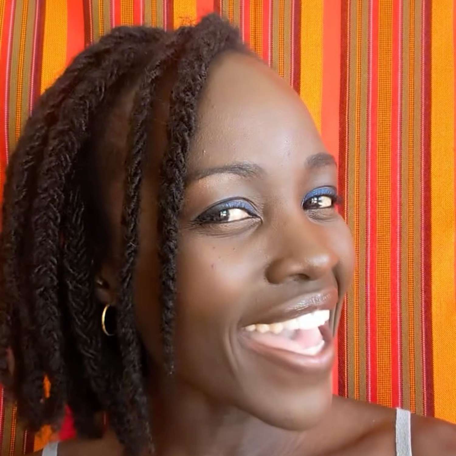 Lupita Nyong'o with a chin-length braided hairstyle