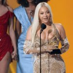 Beyoncé’s Skintight Gold Grammys Dress Is a Subtle Ode to Country Music