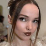 Dove Cameron Wore Wired Headphones in Her Hair and It’s Exactly What We Need Right Now