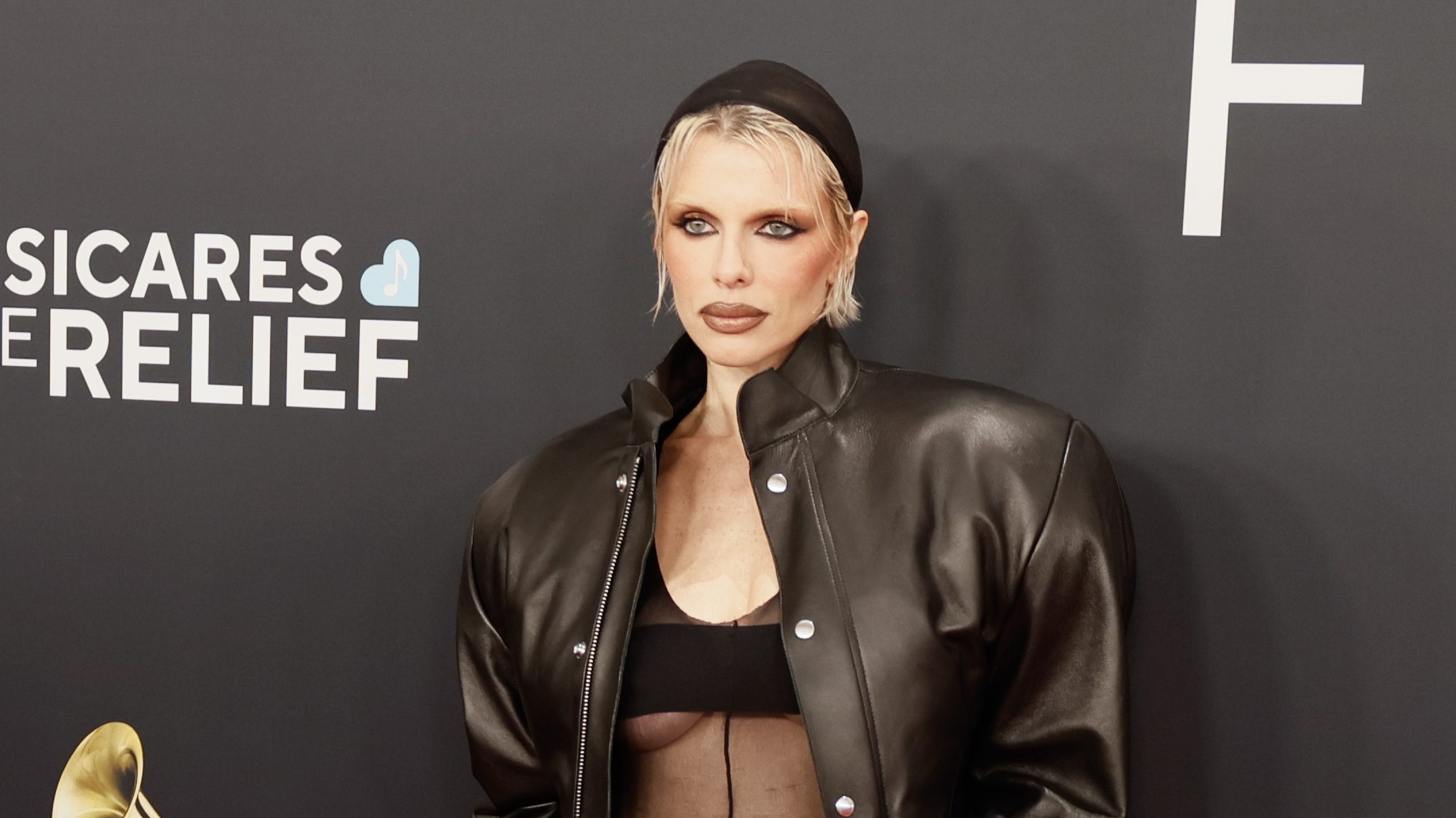 Julia Fox Wore Rubber Gloves, a Hairnet, & a Thong to the 2025 Grammys