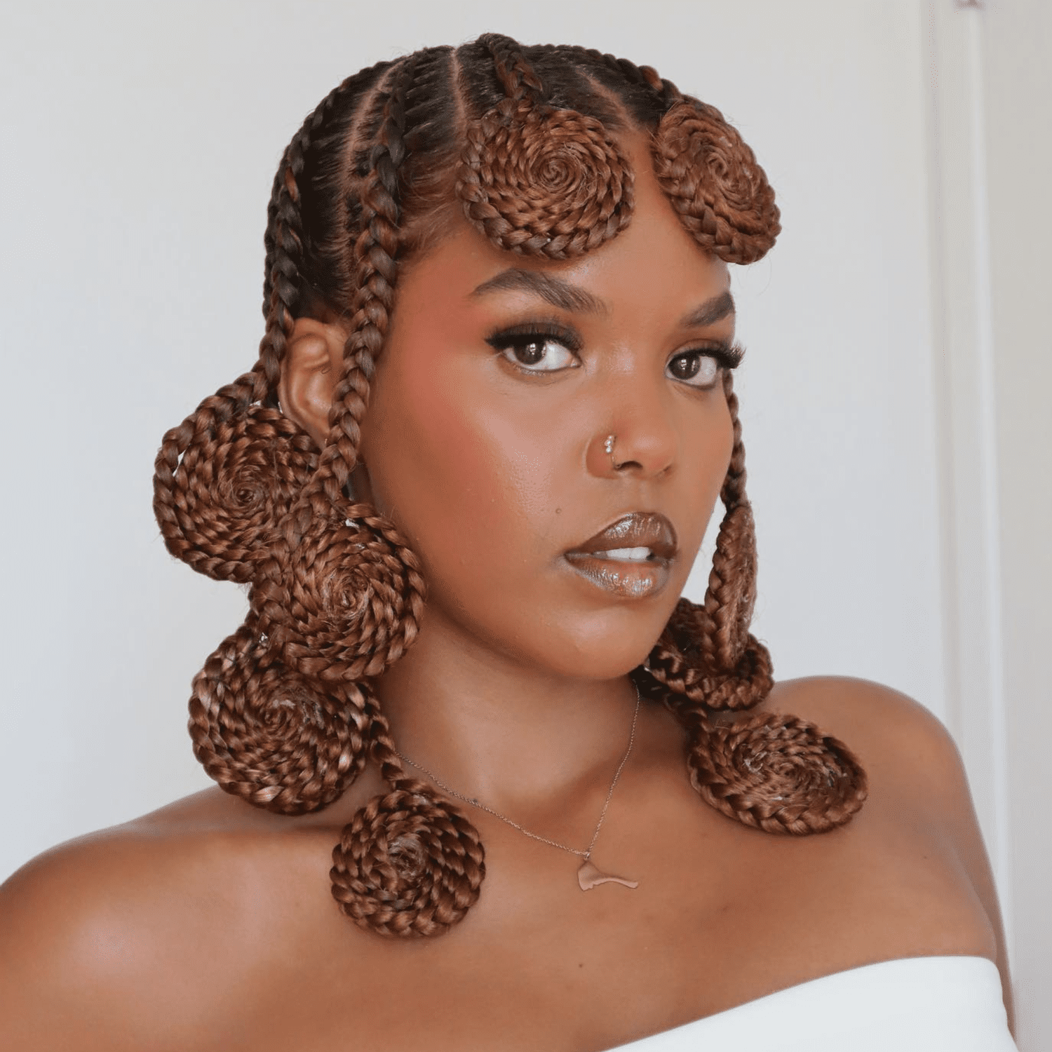 creator Rahel Brhane in copper Koroba braids