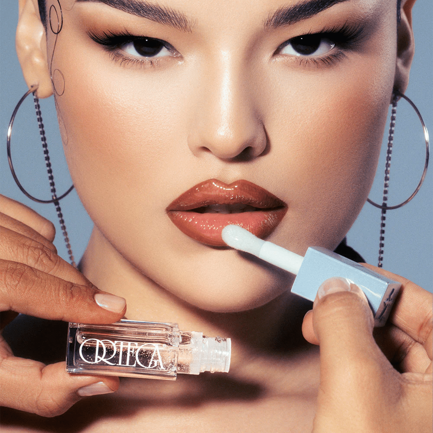 Model wearing the Ortega lip gloss