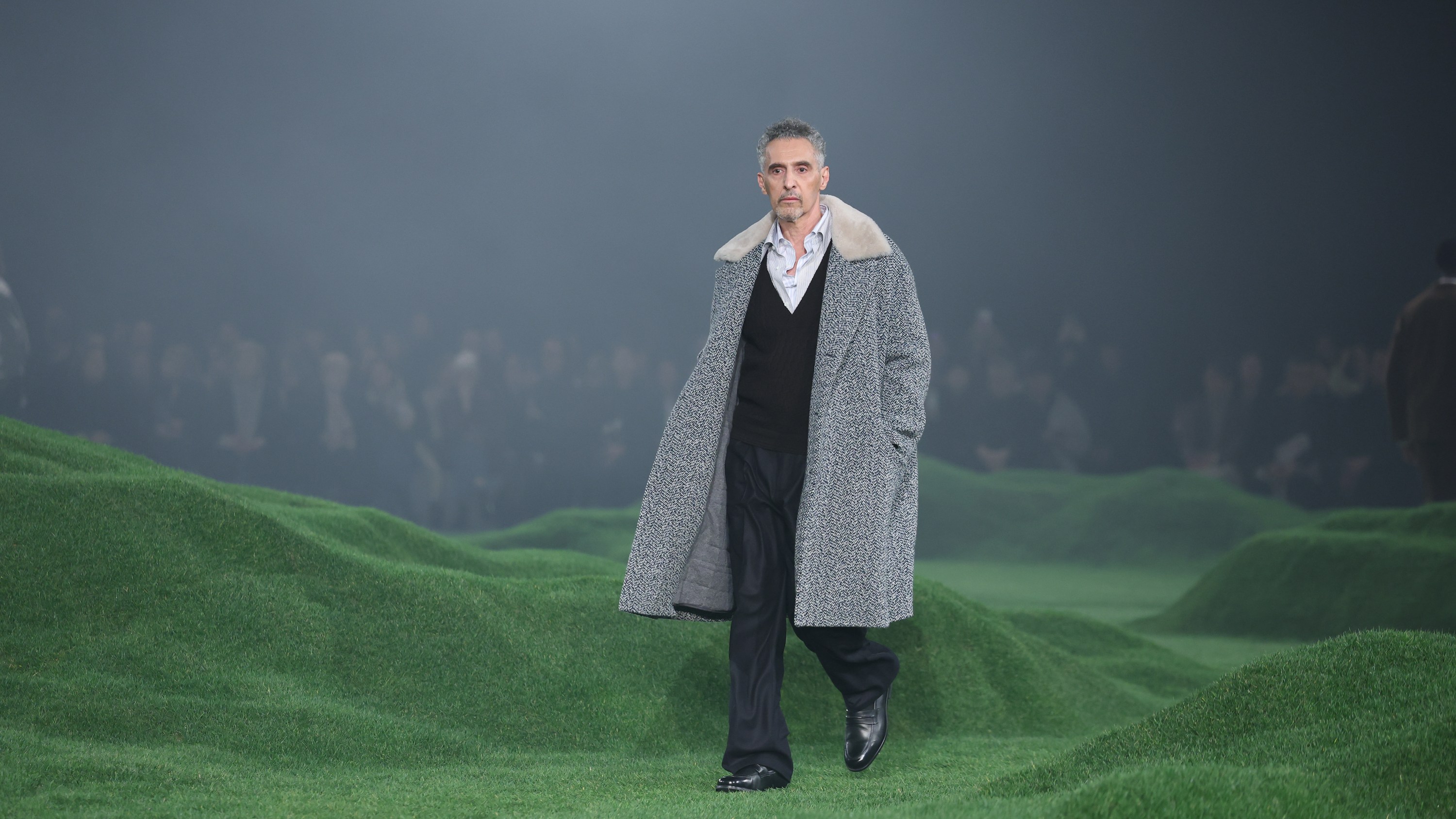 John Turturro walks the runway at the Zegna fashion show during the Milan Menswear Fall/Winter 2025 - 2026 Fashion Week on January 20, 2025 in Milan, Italy.