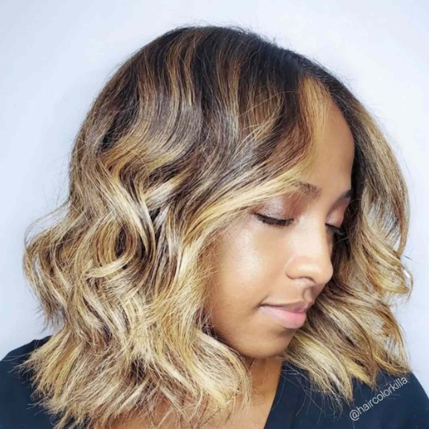 Golden toned balayage on short hair.