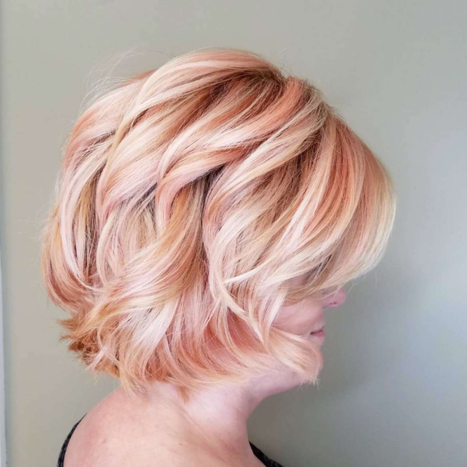 Peach cream balayage on short hair.