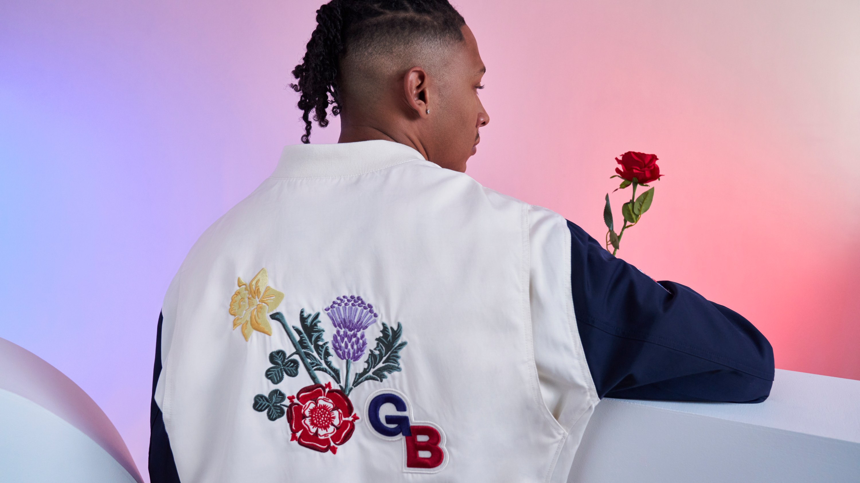 An athlete wears the Team GB jacket.